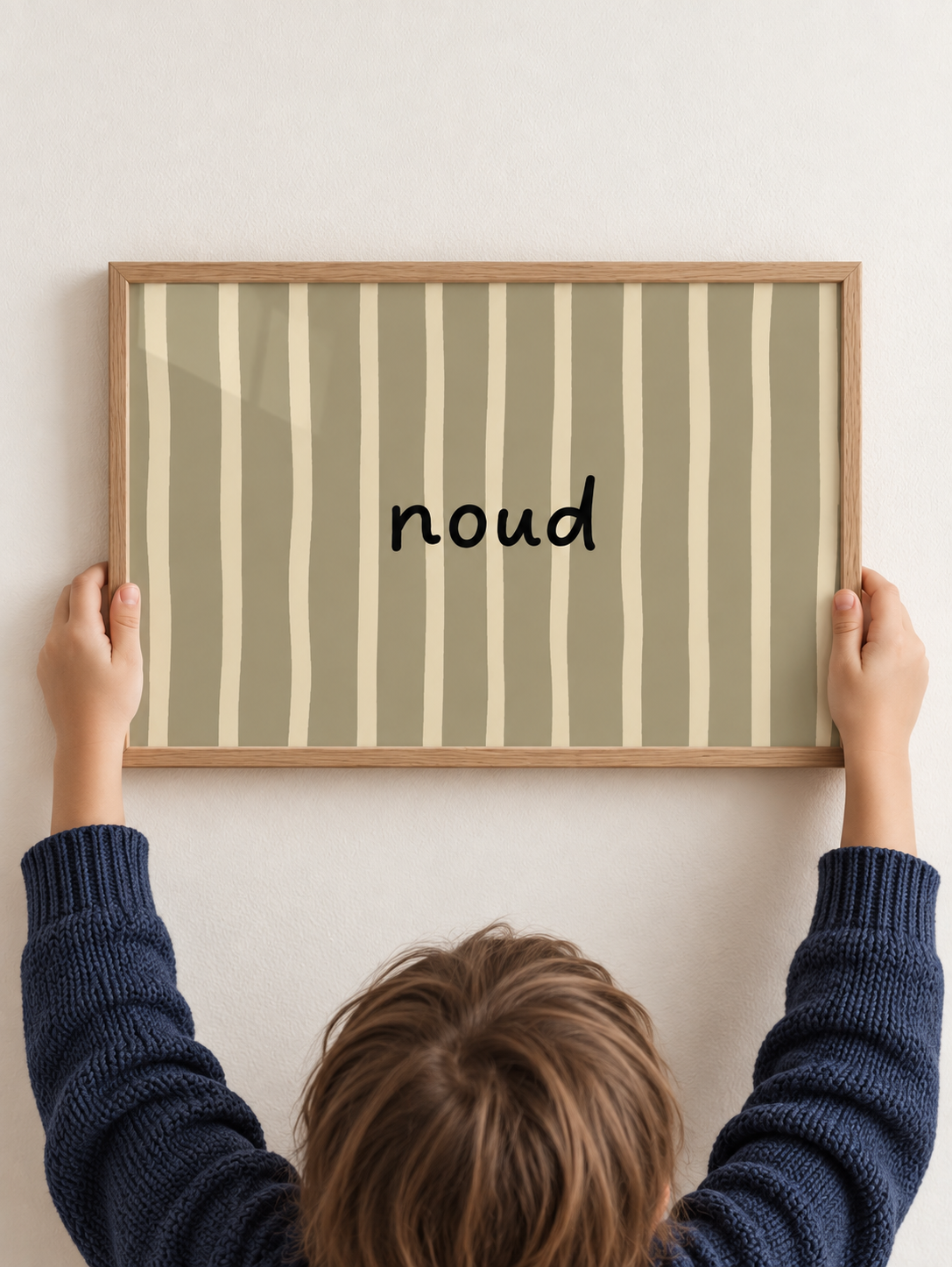 Gepersonaliseerde Flow Stripes naamposter in olijfgroen, vastgehouden in een kinderkamer